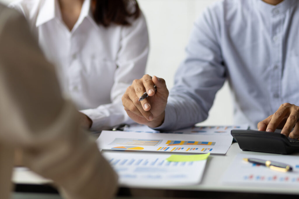 gifford roth tokyo japan meeting financial advisor to analyze income scaled.jpg